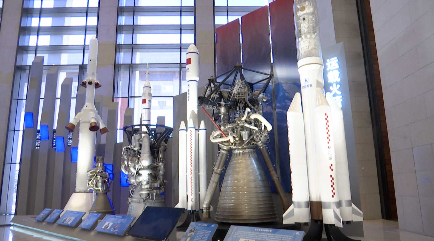 Models of China's Long March rocket series are displayed at an exhibition in Beijing, China, February 24, 2023. /CGTN