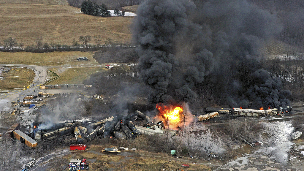 Aerial view shows portions of a Norfolk and Southern freight train that derailed on February 3 night in East Palestine, Ohio still on fire at midday on February 4, 2023. /CFP