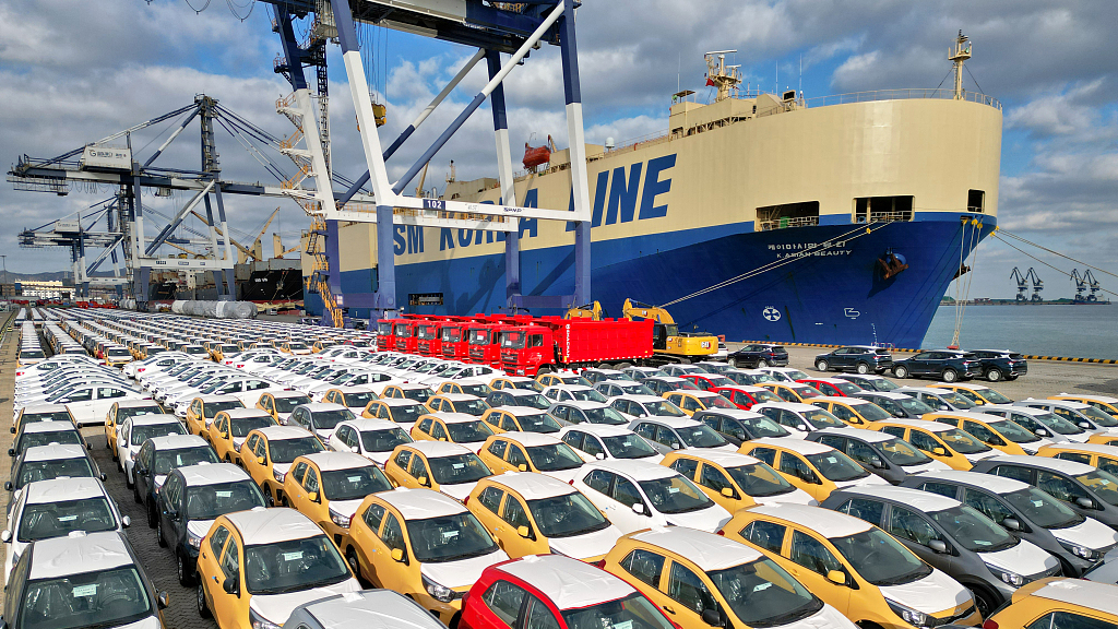 Vehicles wait to be loaded on the pure car and truck carriers in the Yantan Port, east China's Shandong Province, December 11, 2022. /CFP