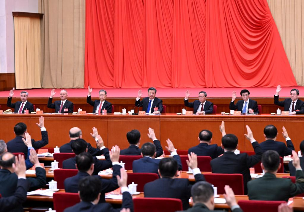 Xi Jinping, Li Qiang, Zhao Leji, Wang Huning, Cai Qi, Ding Xuexiang and Li Xi attend the second plenary session of the 20th Communist Party of China Central Committee in Beijing. /Xinhua