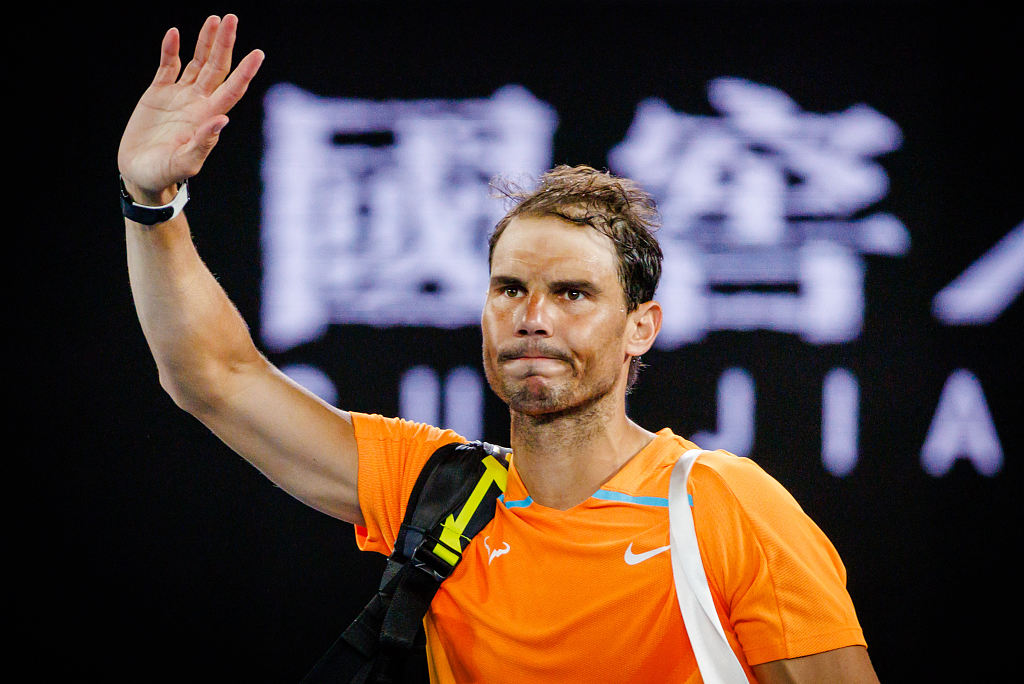 Rafael Nadal of Spain waves to the crowd after his exit at the Australian Open at Melbourne Park in Melbourne, Australia, January 18, 2023. /CFP 