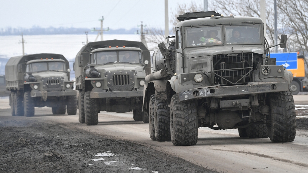 Military trucks drive along a road near the border between Russia and Ukraine in Belgorod region, Russia, February 28, 2022. /CFP