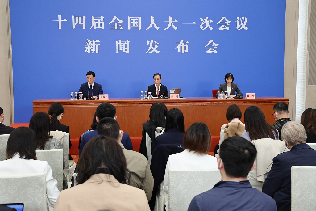 Wang Chao (L2) attends a press conference at the Great Hall of the People in Beijing, capital of China, March 4, 2023. /CFP