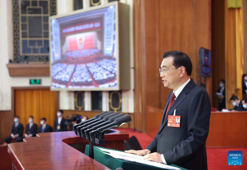 Chinese Premier Li Keqiang delivers a government work report at the opening meeting of the first session of the 14th National People's Congress (NPC) at the Great Hall of the People in Beijing, capital of China, March 5, 2023. /Xinhua
