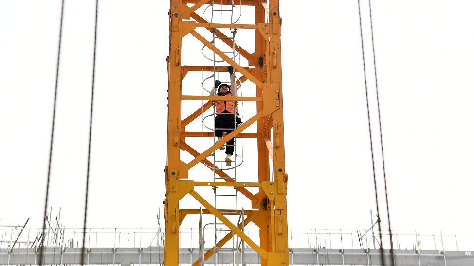 A female worker at a construction site in Xiong'an New Area, north China's Hebei Province, March 8, 2023. /CFP