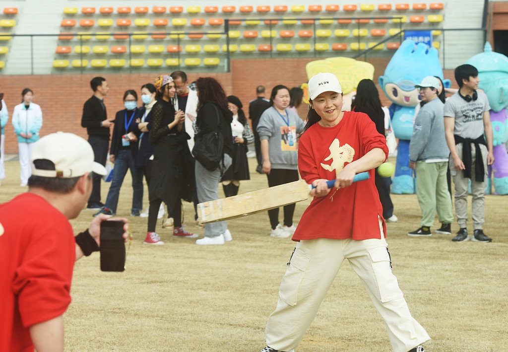 Residents in Hangzhou experience the fun of cricket as the pitch used for the Asian Games is open to the public for the first time, March 7, 2023. /CFP