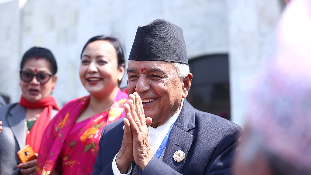 Leader of the Nepali Congress party Ram Chandra Poudel greets and meets supporting lawmakers at the Federal Parliament premises in capital Kathmandu, Nepal, March 9, 2023. /CFP 