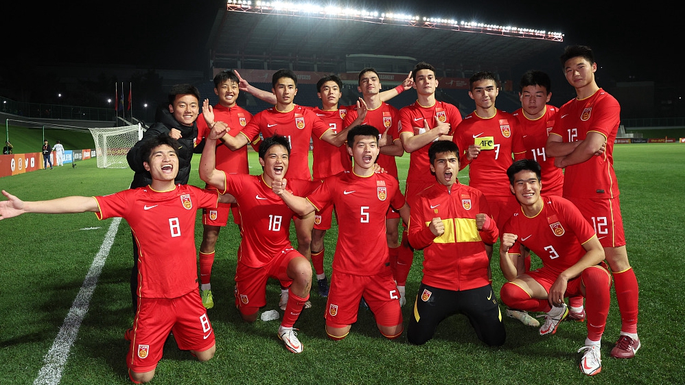 China players celebrate on the pitch after their U20 Asian Cup clash with Kyrgyzstan at the JAR Stadium in Tashkent, Uzbekistan, March 9, 2023. /CFP