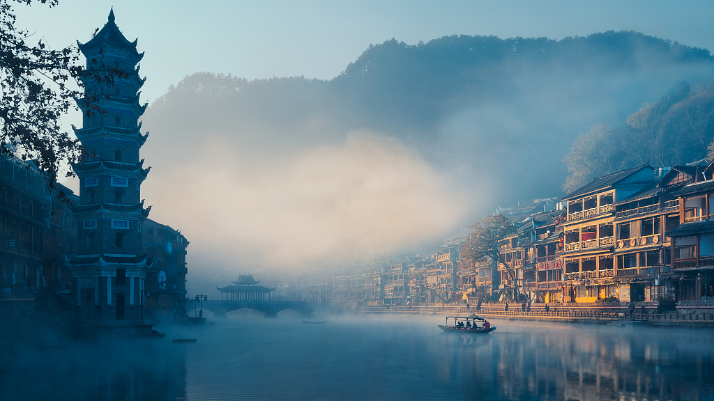 Fenghuang Ancient Town is located in the Wuling Mountain (Xiangxi) Tujia and Miao ethnic cultural and ecological protection zone in Hunan Province. /CFP
