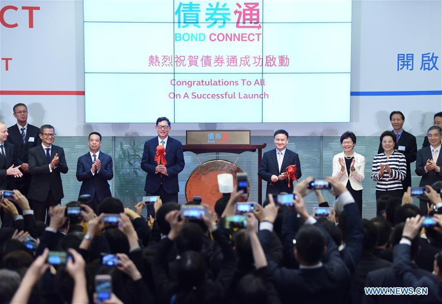 Participants attend a ceremony held by Hong Kong Exchanges and Clearing Limited to launch the 