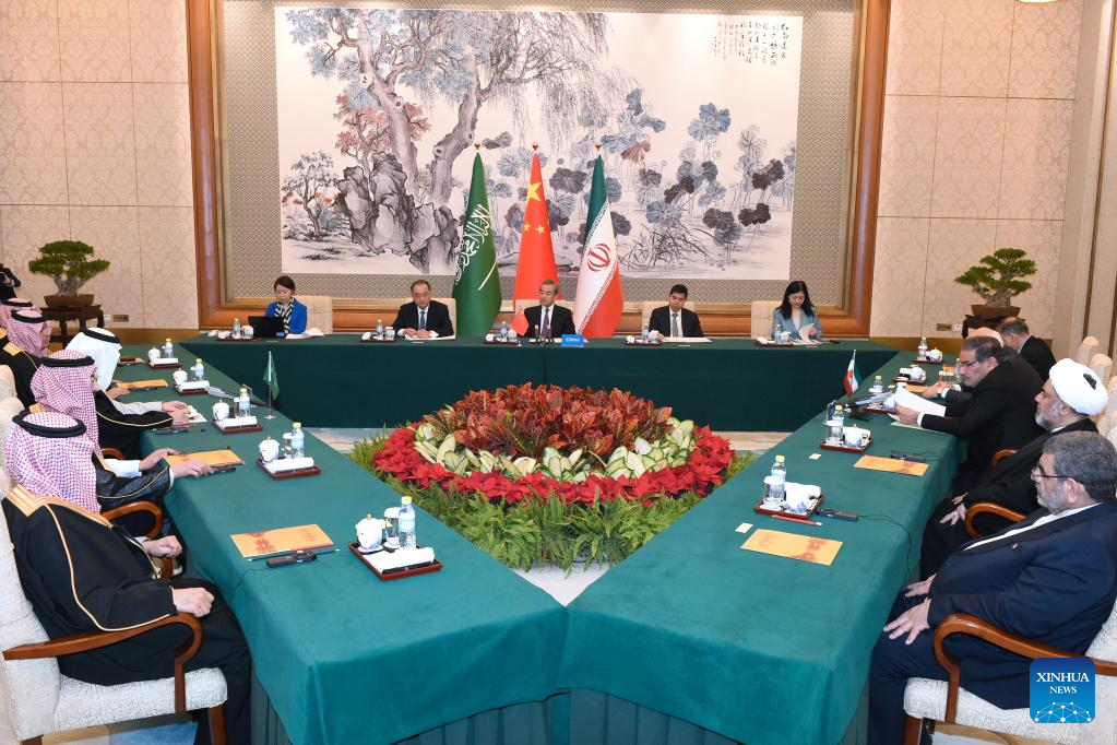 Wang Yi, a member of the Political Bureau of the Communist Party of China (CPC) Central Committee and director of the Office of the Foreign Affairs Commission of the CPC Central Committee, presides over the closing meeting of the talks between a Saudi delegation and an Iranian delegation in Beijing, capital of China, March 10, 2023. /Xinhua