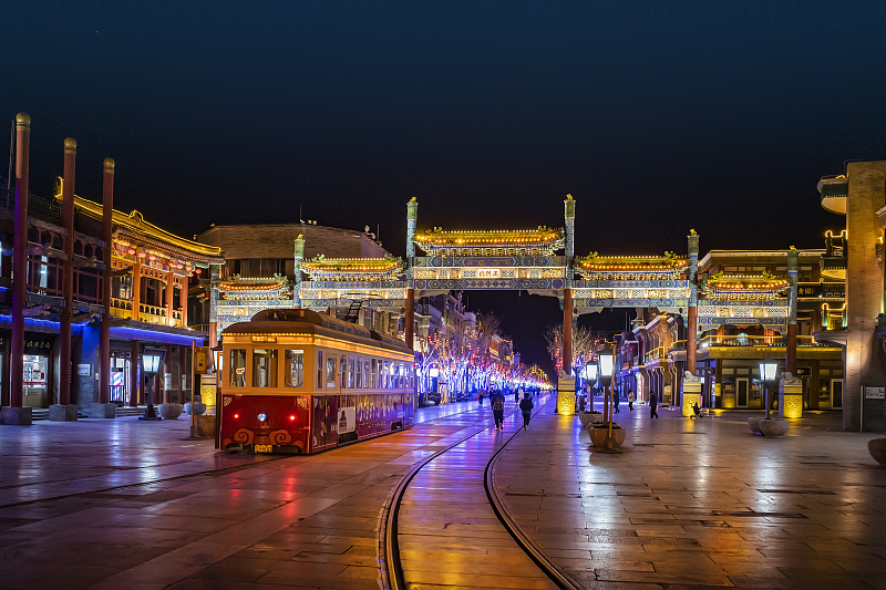 A tram service runs along Qianmen Street in Beijing. /CFP