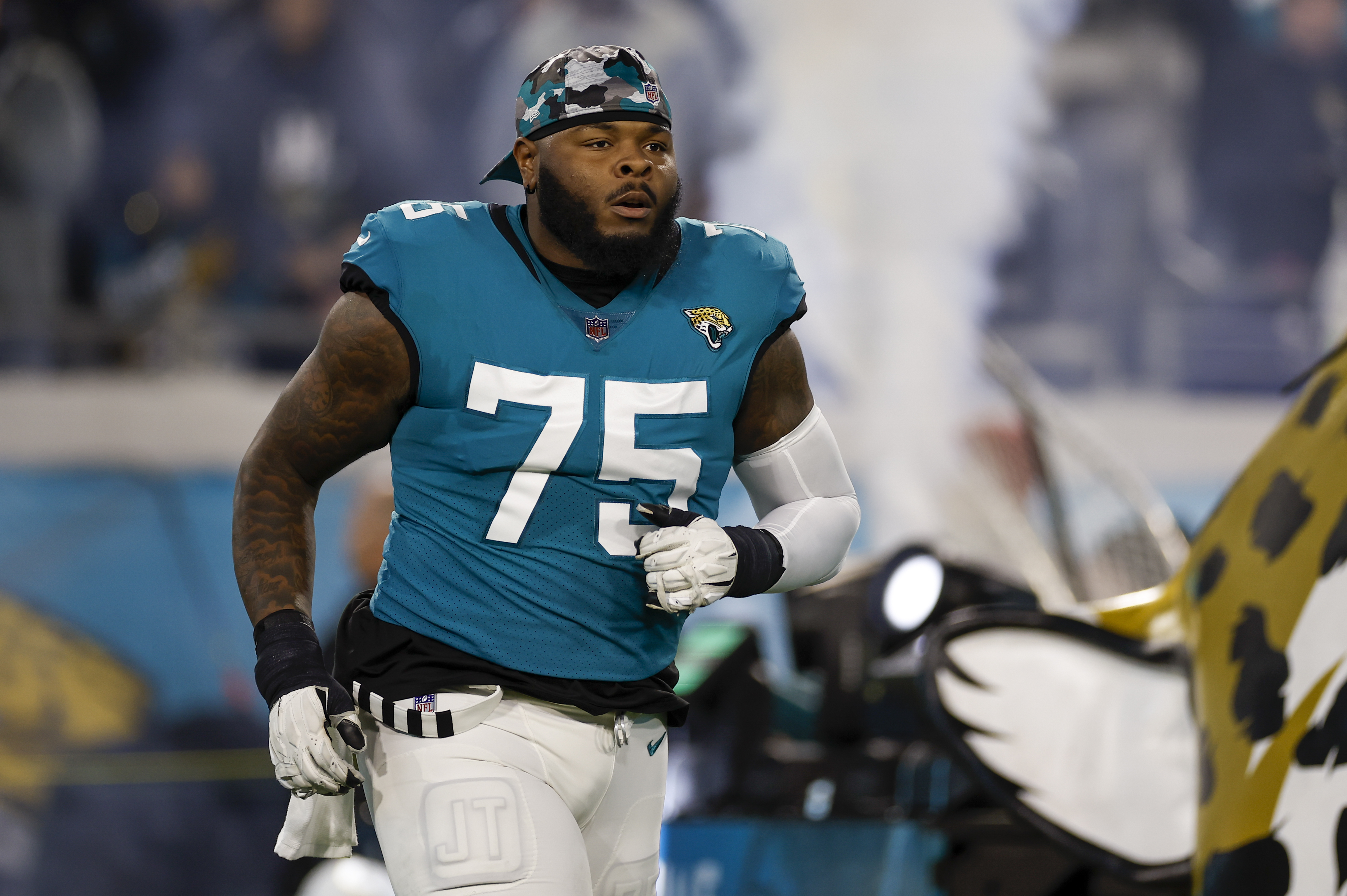 Offensive tackle Jawaan Taylor of the Jacksonville Jaguars looks on in the game against the Los Angeles Chargers at TIAA Bank Field in Jacksonville, Florida, January 14, 2023. /CFP