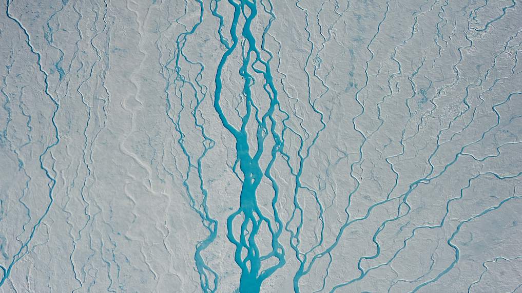 Meltwater rivers on the Greenland ice sheet, January 18, 2023. /CFP