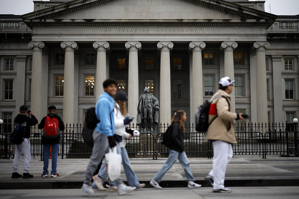 People walk past the U.S. Department of Treasury building in Washington, D.C., U.S., March 13, 2023. /CFP