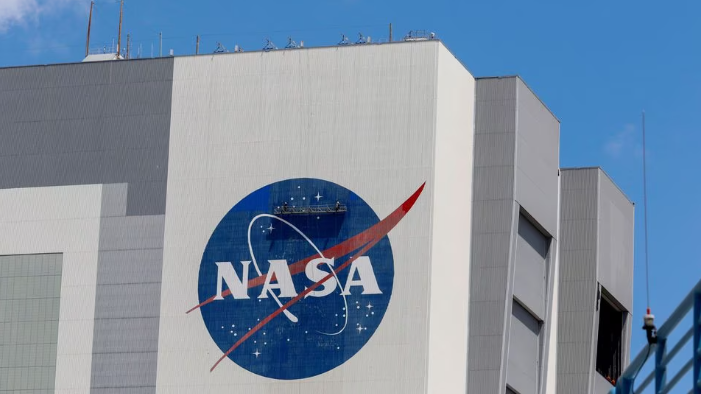 The logo of NASA is on the Vehicle Assembly Building at the Kennedy Space Center in Cape Canaveral, Florida, U.S., May 19, 2020. /Reuters