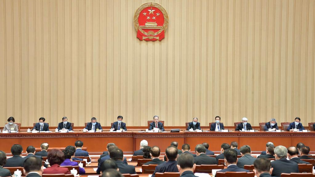 Zhao Leji, the newly elected chairman of the NPC Standing Committee, presides over the first meeting of the 14th NPC Standing Committee in Beijing, China, March 14, 2023. /Xinhua