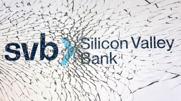 Silicon Valley Bank logo is seen through broken glass in this illustration, March 10, 2023. /Reuters