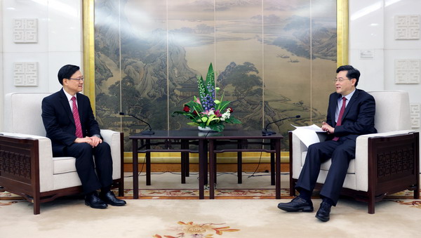 Chinese State Councilor and Foreign Minister Qin Gang (R) meets with Chief Executive of the Hong Kong Special Administrative Region John Lee in Beijing, China, March 16, 2023. /Chinese Foreign Ministry