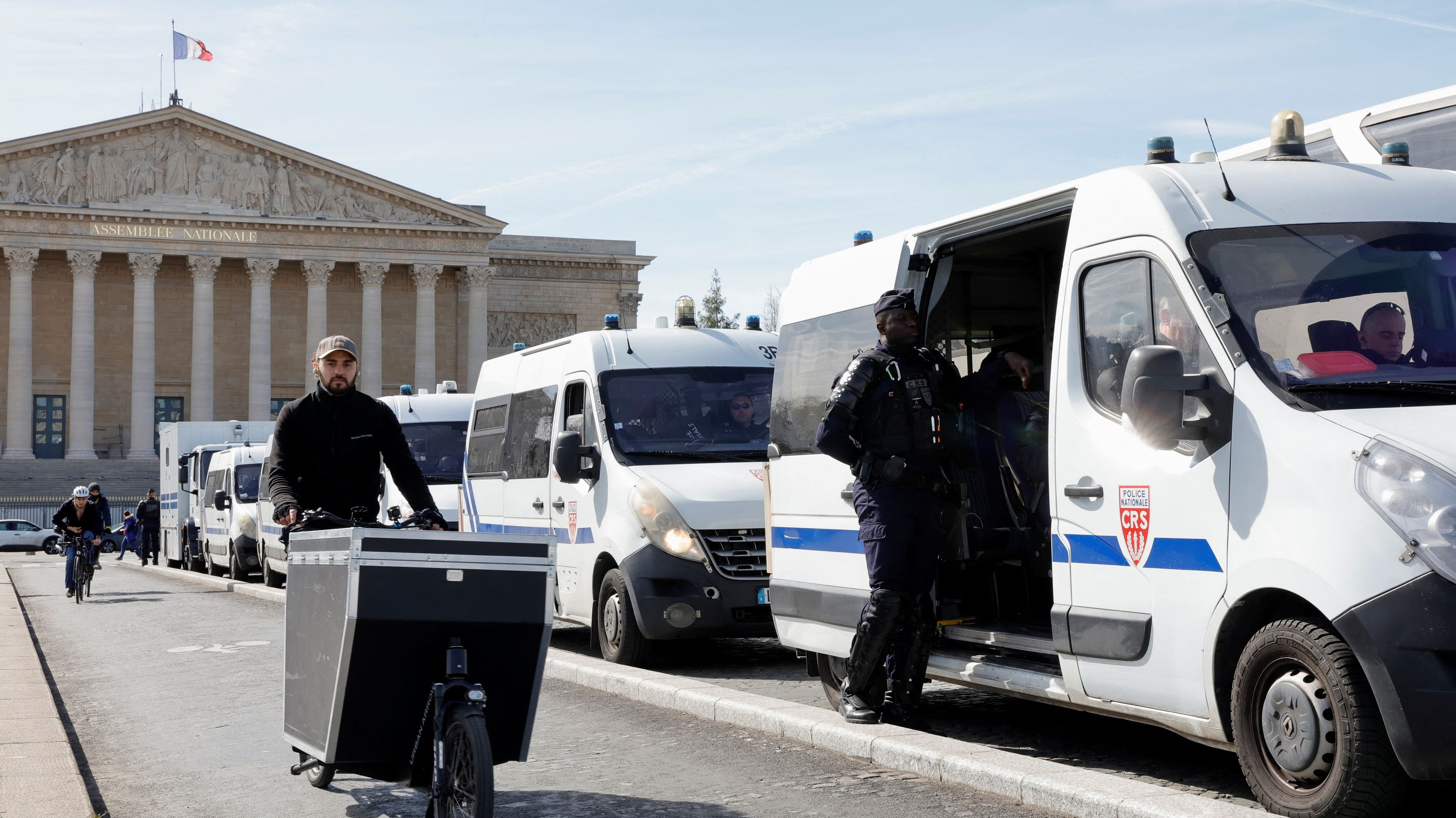 French CRS riot police stand guard in front of the National Assembly in Paris, France, March 16, 2023. /Reuters