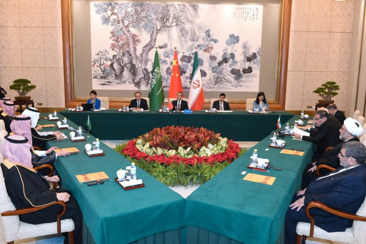 Wang Yi (C), a member of the Political Bureau of the Communist Party of China (CPC) Central Committee and director of the Office of the Foreign Affairs Commission of the CPC Central Committee, presides over the closing meeting of the talks between a Saudi delegation and an Iranian delegation in Beijing, capital of China, March 10, 2023. /Xinhua