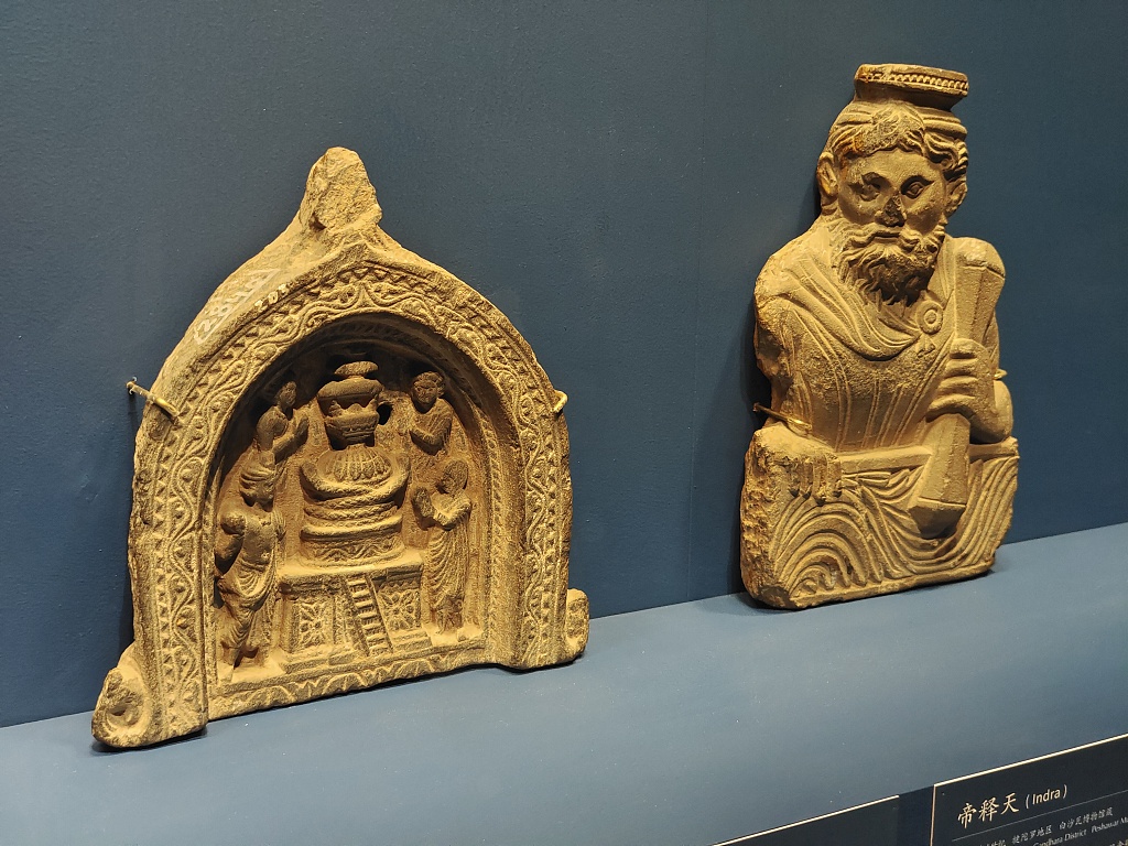 Artifacts from the 'Gandhara Heritage Along the Silk Road' exhibition are displayed at the Palace Museum, Beijing. /CFP