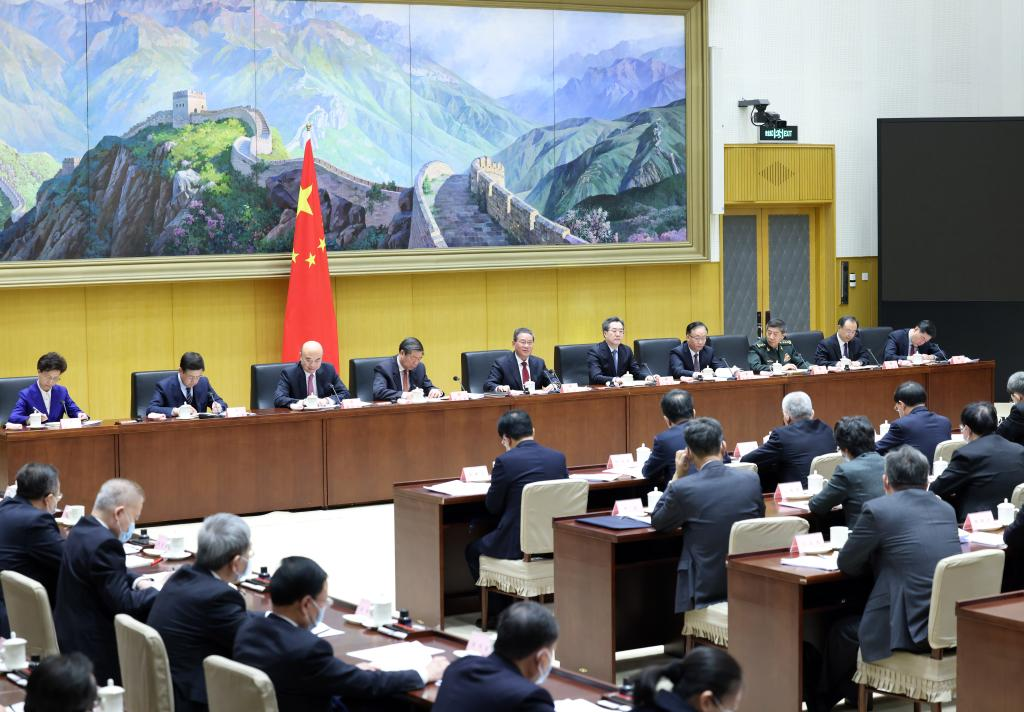 Chinese Premier Li Qiang presides over the first plenary meeting of China's new-term State Council, in Beijing, China, March 17, 2023. /Xinhua