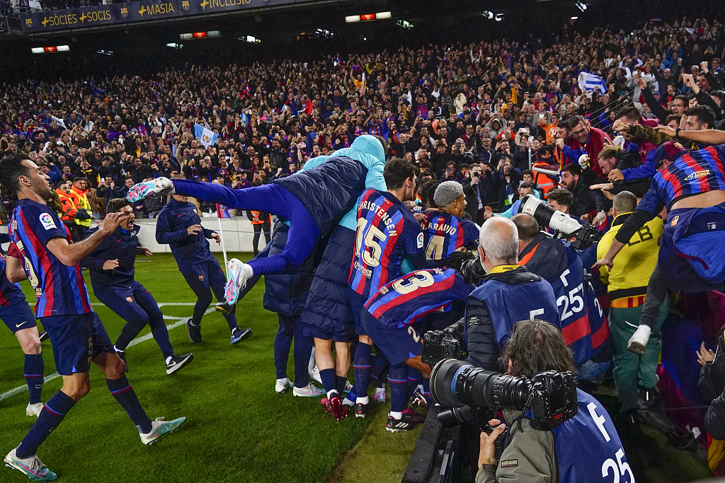 Barcelona players react after their win over Real Madrid at Camp Nou in Barcelona, Spain, March 19, 2023. /CFP
