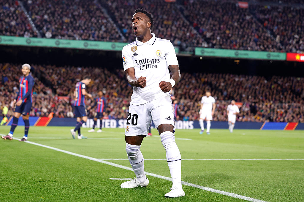 Real Madrid's Vinicius Jr celebrates after causing an own goal from Ronald Araujo during their clash with Barcelona at Camp Nou in Barcelona, Spain, March 19, 2023. /CFP