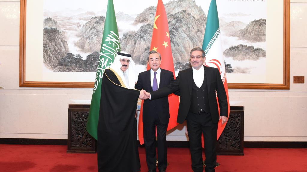 Wang Yi (C), a member of the Political Bureau of the Communist Party of China (CPC) Central Committee and director of the Office of the Foreign Affairs Commission of the CPC Central Committee, attends a closing meeting of the talks between the Saudi delegation led by Musaad bin Mohammed Al-Aiban (L), Saudi Arabia's Minister of State, Member of the Council of Ministers and National Security Advisor, and Iranian delegation led by Admiral Ali Shamkhani (R), Secretary of the Supreme National Security Council of Iran, in Beijing, China, March 10, 2023. /Xinhua