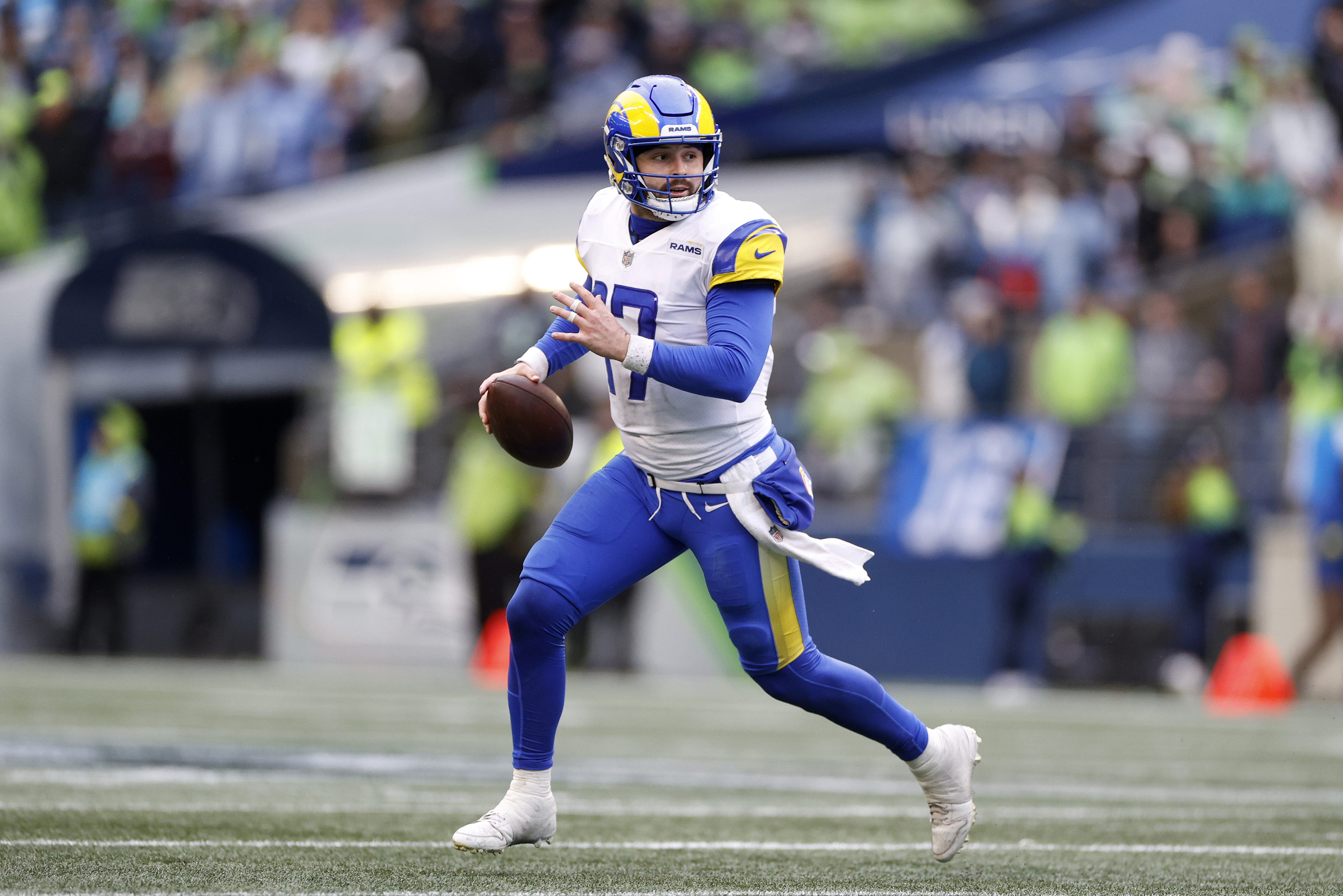 Quarterback Baker Mayfield of the Los Angeles Rams runs in the game against the Seattle Seahawks at Lumen Field in Seattle, Washington, January 8, 2023. /CFP 