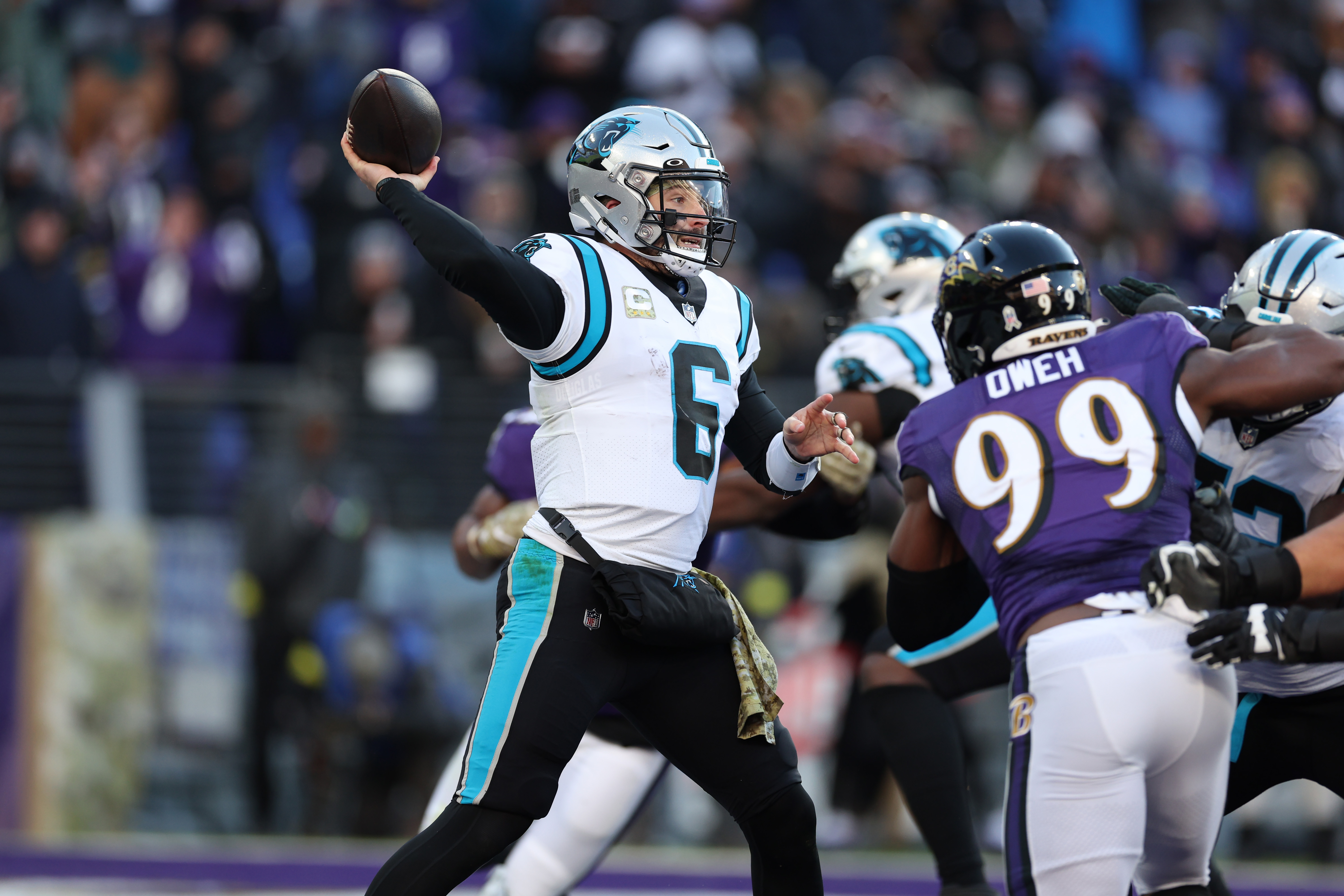 Quarterback Baker Mayfield (#6) of the Carolina Panthers passes in the game against the Baltimore Ravens at the M&T Bank Stadium in Baltimore, Maryland, November 20, 2022. /CFP 