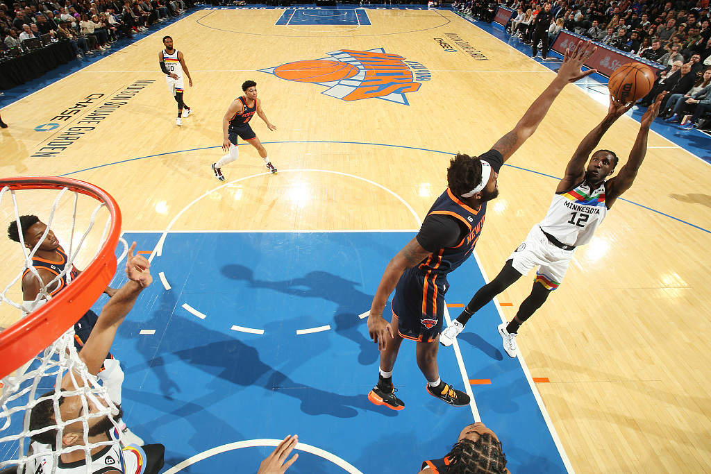 Taurean Prince (#12) of the Minnesota Timberwolves shoots in the game against the New York Knicks at Madison Square Garden in New York City, March 20, 2023. /CFP