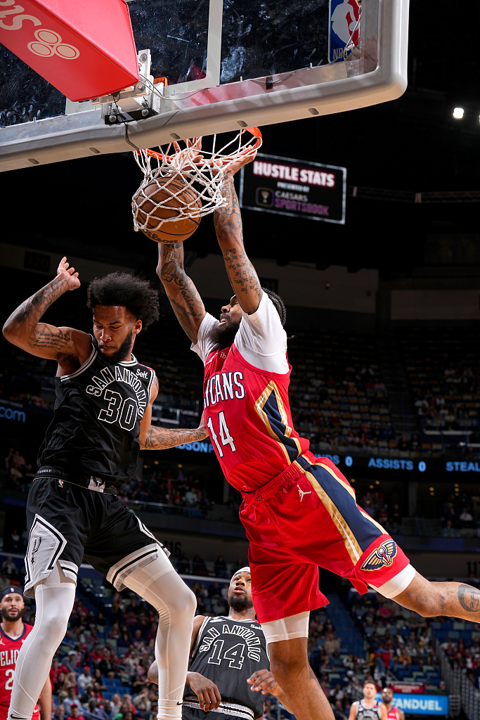 Brandon Ingram (#14) of the New Orleans Pelicans dunks in the game against the San Antonio Spurs at the Smoothie King Center in New Orleans, Louisiana, March 21, 2023. /CFP
