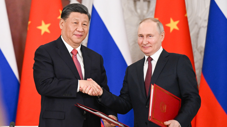 Chinese President Xi Jinping and Russian President Vladimir Putin shake hands after jointly signing a Joint Statement of the People's Republic of China and the Russian Federation on Deepening the Comprehensive Strategic Partnership of Coordination for the New Era and a Joint Statement of the President of the People's Republic of China and the President of the Russian Federation on Pre-2030 Development Plan on Priorities in China-Russia Economic Cooperation in Moscow, Russia, March 21, 2023. /Xinhua