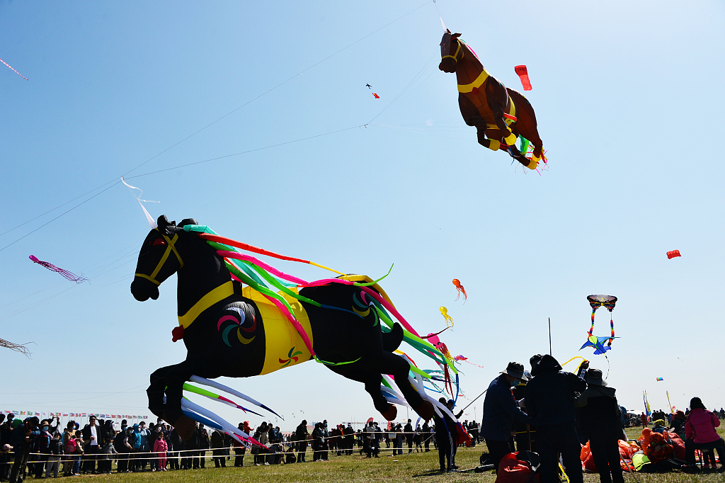 Horse-shaped kites flying at the Weifang International Kite Festival in Weifang, Shandong, April 17, 2021. /CFP
