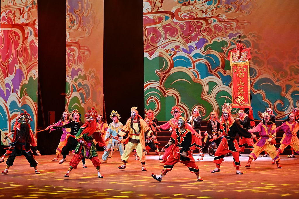 A Yingge dance performance is seen at the 2023 intangible cultural heritage brand summit in Guangzhou, south China's Guangdong Province, on March 23, 2023. /CFP