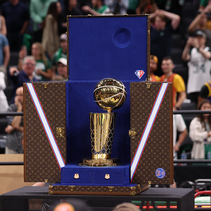 Reacting to the NBA Finals trophy being presented in a Louis Vuitton case