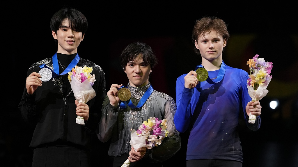 L-R: Cha Junhwan, Shoma Uno and Ilia Malinin pose with their medals after men's free skate at the World Figure Skating Championships in Saitama, Japan, March 25, 2023. /CFP