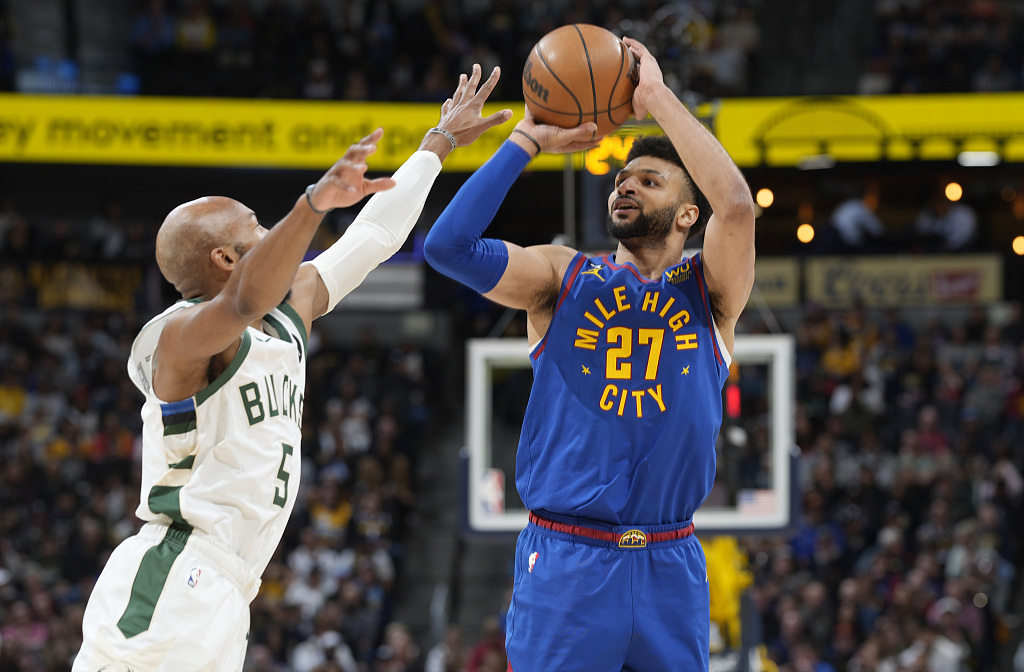 Jamal Murray (#27) of the Denver Nuggets shoots in the game against the Milwaukee Bucks at Ball Arena in Denver, Colorado, March 25, 2023. /CFP