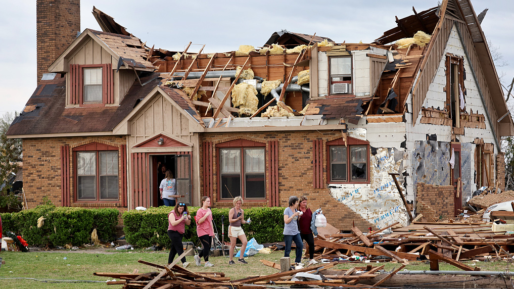 Residents continue to recover possessions and secure homes that were damaged by Friday's tornado in Rolling Fork, Mississippi, U.S., March 26, 2023./CFP
