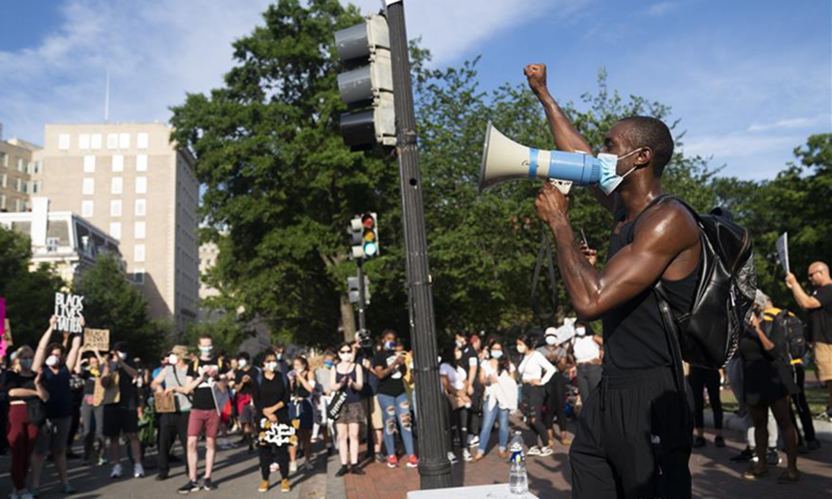 Demonstrators protest against racial injustice to mark Juneteenth, commemorating the end of slavery in the United States, near the White House in Washington, D.C., the U.S., June 19, 2020. /Xinhua