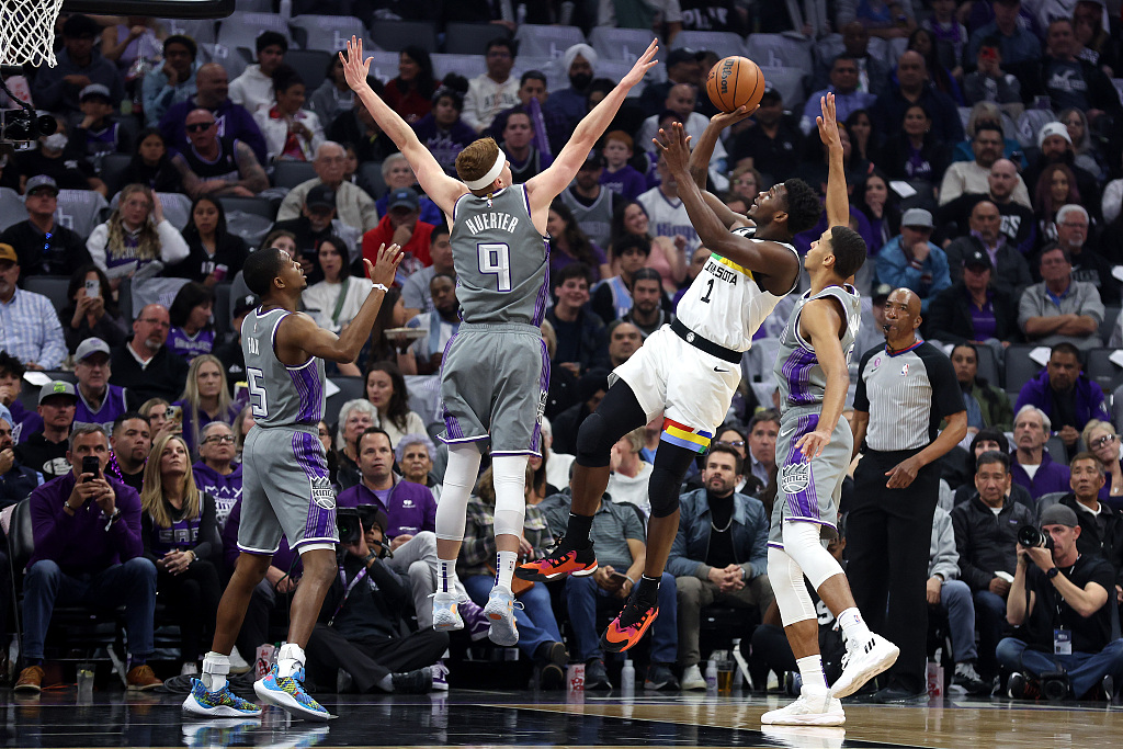 Anthony Edwards (#1) of the Minnesota Timberwolves shoots in the game against the Sacramento Kings at the Golden 1 Center in Sacramento, California, March 27, 2023. /CFP