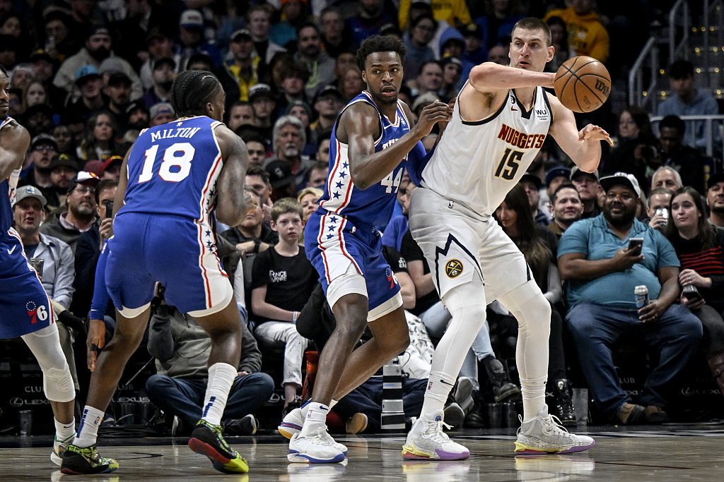 Nikola Jokic (#15) of the Denver Nuggets passes in the game against the Philadelphia 76ers at Ball Arena in Denver, Colorado, March 27, 2023. /CFP