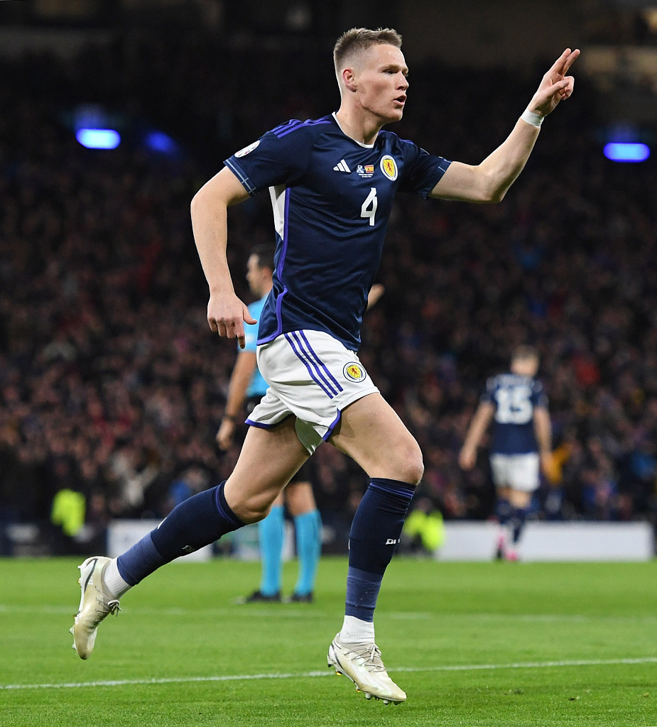Scott McTominay of Scotland celebrates after scoring a brace against Spain during their Euro 2024 qualifier at Hampden Park in Glasgow, Scotland, March 28, 2023. /CFP 