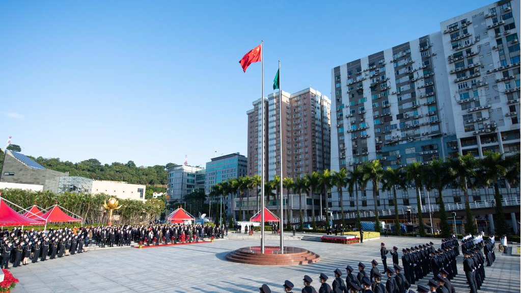 A flag-raising ceremony marking the 23rd anniversary of Macao's return to the motherland is held at the Golden Lotus Square in Macao, south China, December 20, 2022. /Xinhua