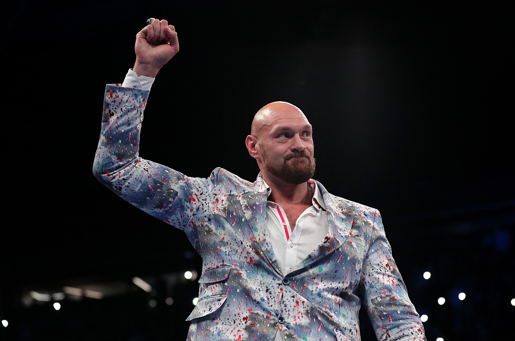 Tyson Fury of Britain reacts to the Vacant WBO Interim World Heavyweight Championship fight between Joe Joyce and Joseph Parker at the AO Arena in Manchester, Britain, September 24, 2022. /CFP 