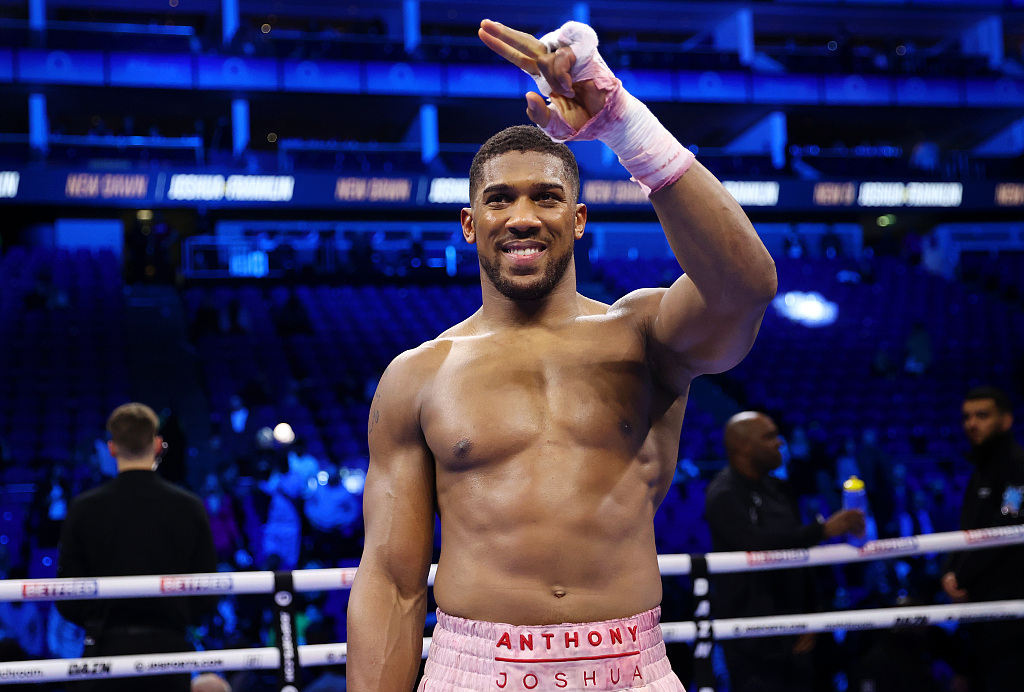 Anthony Joshua of Britain celebrates his win over Jermaine Franklin of the U.S. in the heavyweight fight at the O2 Arena in London, Britain, April 1, 2023. /CFP