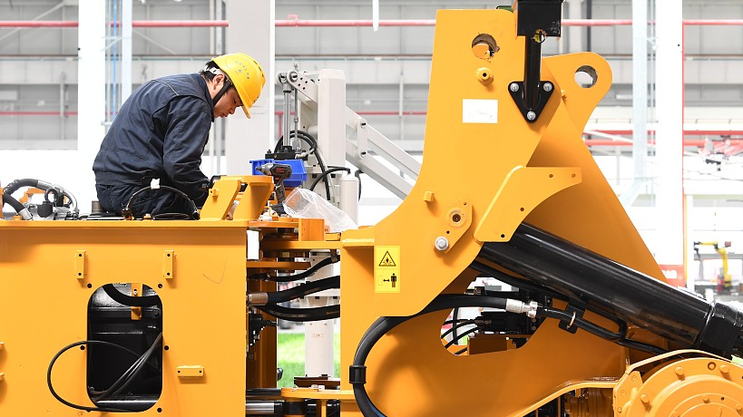 Workers producing specialized equipment at a manufacturing base in Wuxing District, Huzhou City, east China's Zhejiang Province, April 1, 2023. /CFP