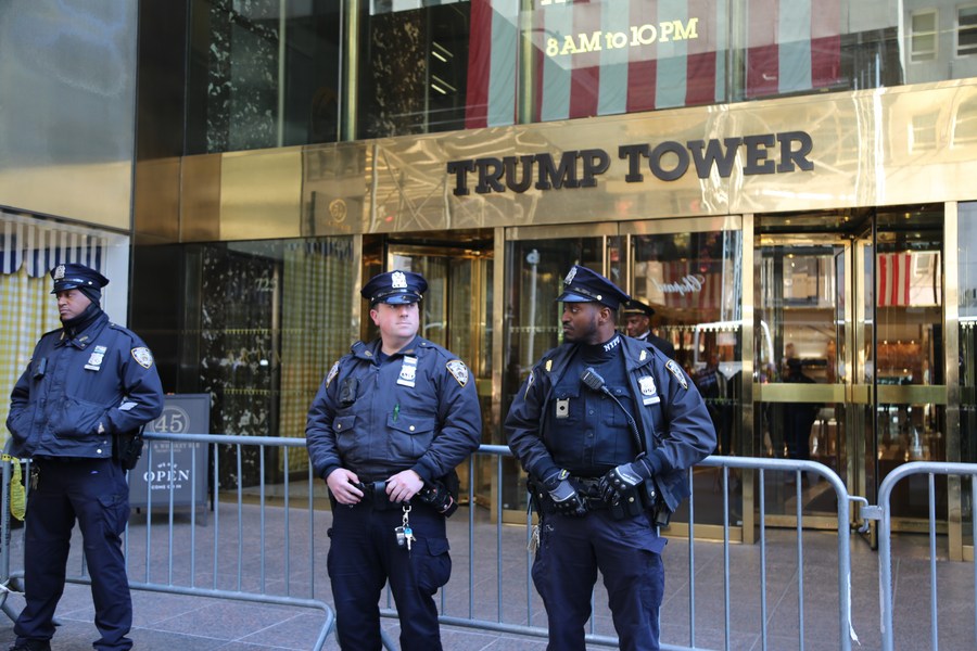 Policemen stand guard in front of Trump Tower in New York, the United States, March 21, 2023. /Xinhua